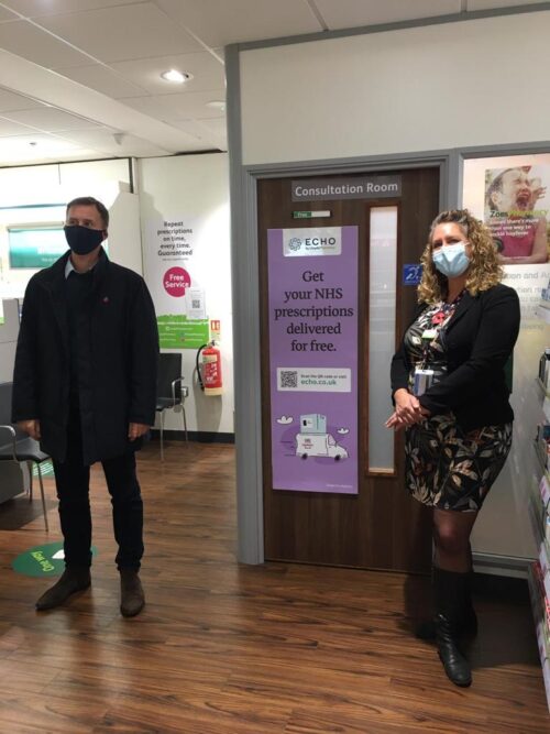 Jeremy Hunt receives his flu vaccine at a LloydsPharmacy: he is on the left of the picture and a member of the pharmacy team is on the right